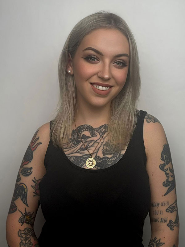 Jade Wildman tattooing
