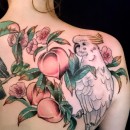 back piece tattoo of a cockatoo in a peach tree in colour