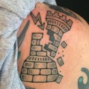 tattoo of exploding rook chess piece tower with lightning bolt in black and grey