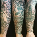 hand poked sleeve of mermaid and lighthouse with waves in black and grey