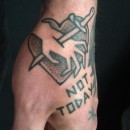 hand tattoo of a love heart with a hand on top and a sword going through the hand with the text not today written underneath
